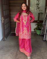 Rani pink Leheriya organza suit with zari work