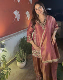 Shimmer tissue with intricate mirror work with a classic Farshi salwar